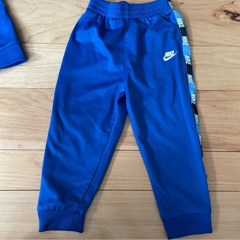 Nike both tracksuits